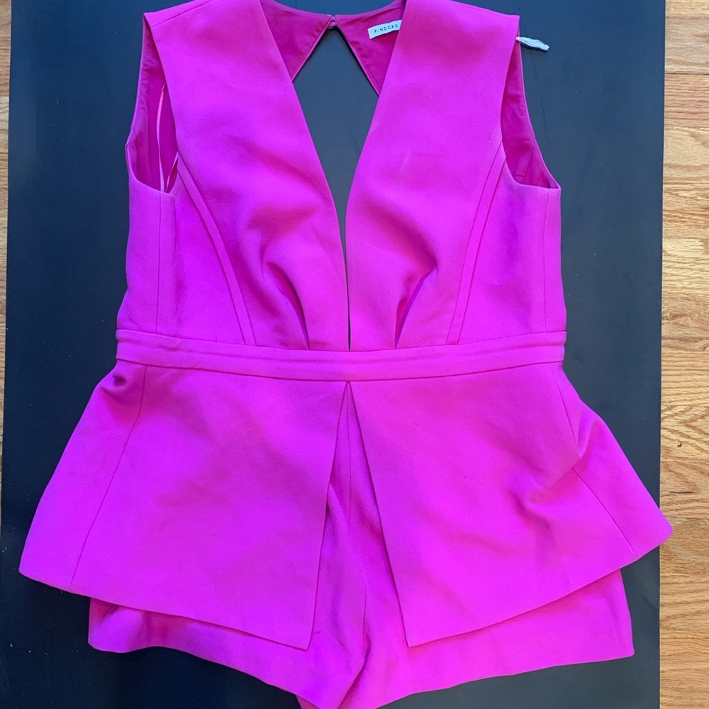 Pink romper with open back